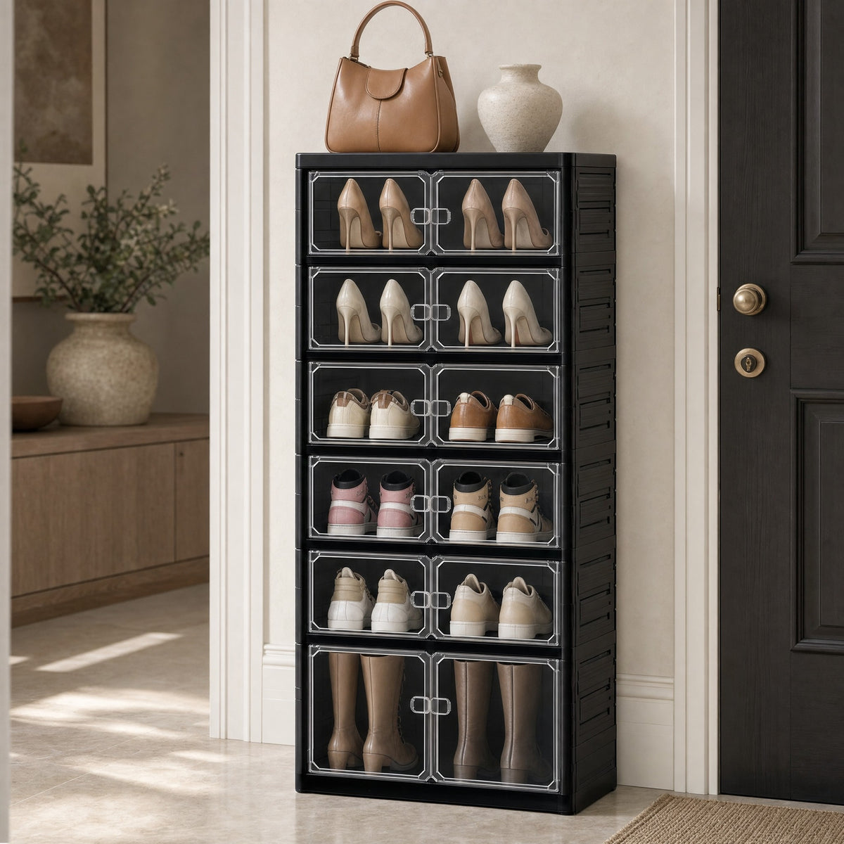 Black 6-layer shoe cabinet beside a front door, with a handbag and ceramic vase on top
