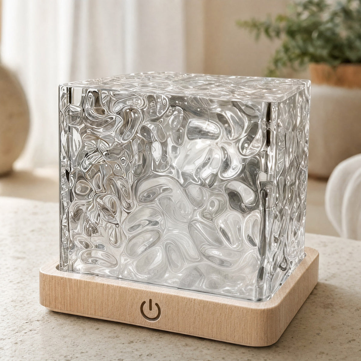 The cube lamp switched off in daylight, showing the textured translucent shade and pale wood base