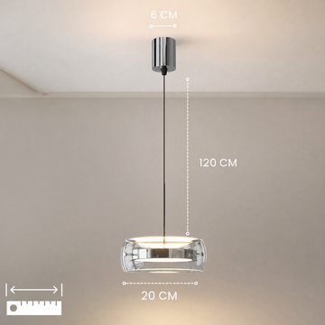 Glass drum pendant light illuminating a modern interior