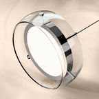 Silver glass drum pendant light in a modern living space