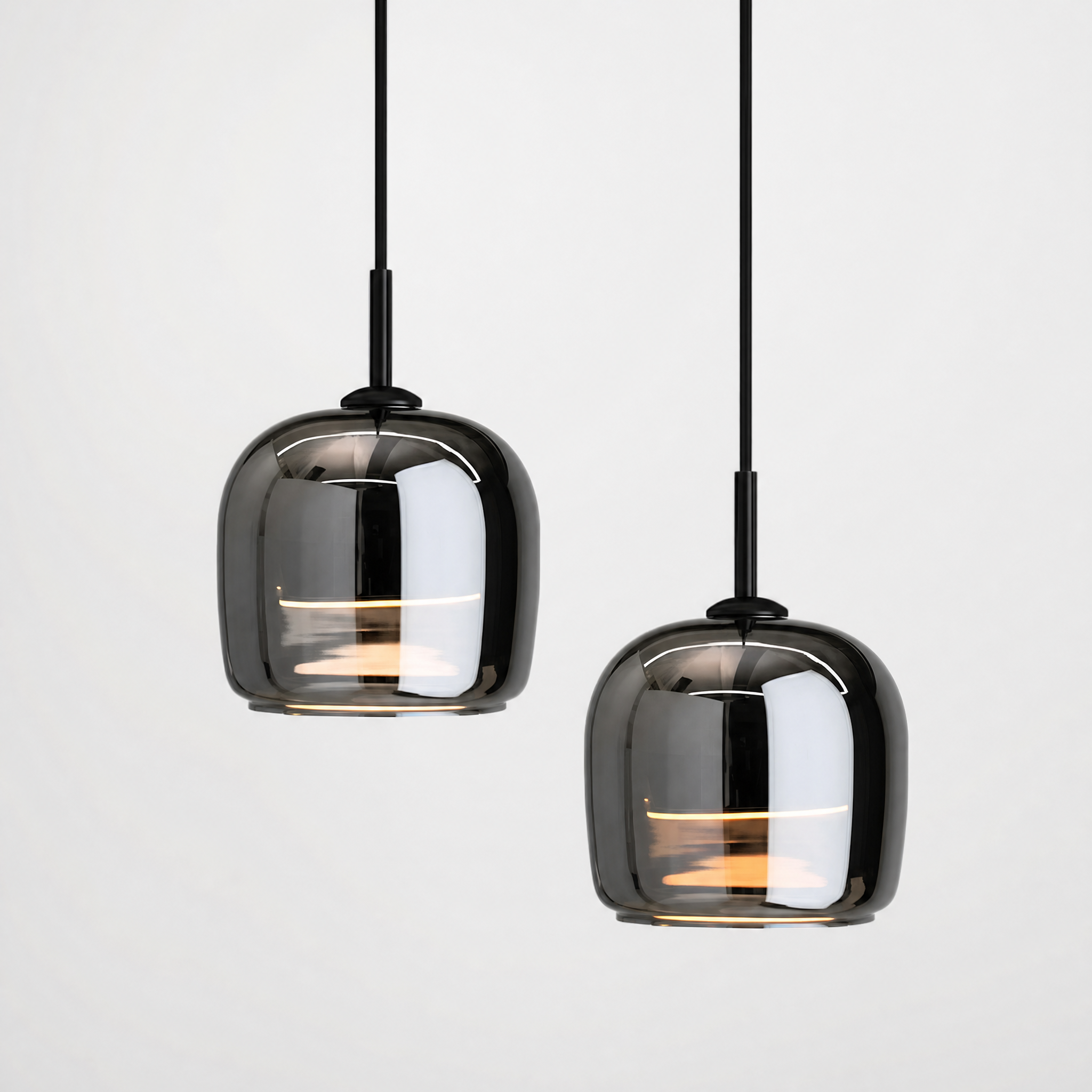 Three-head moon glass pendant light cluster over a dining table