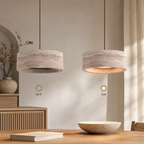 Travertine pendant light styled above a kitchen island