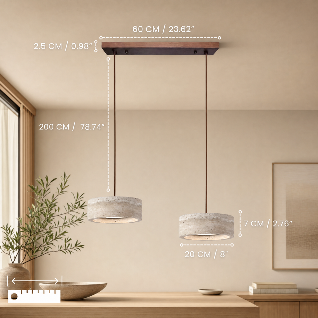 Travertine stone pendant light above a dining table at night