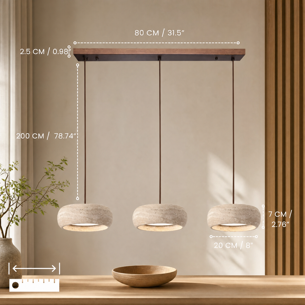 Travertine stone pendant light illuminating a kitchen island