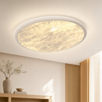 Black moon ceiling light flush mounted on a ceiling