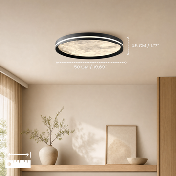 Close-up of the minimalist moon ceiling light design