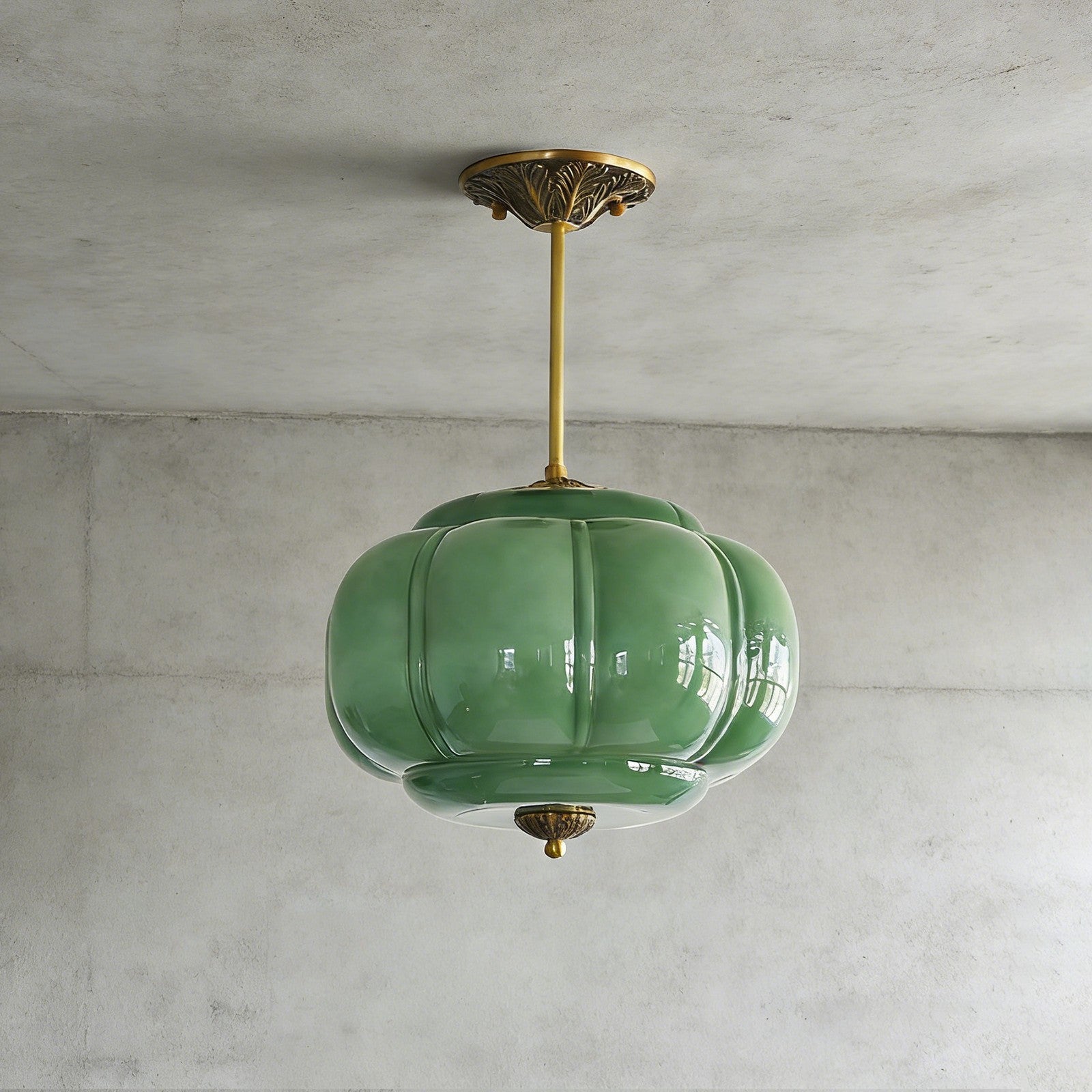 Elegant Green Glass Pendant Lighting with Antique Brass Accents for Stylish Kitchen Illumination