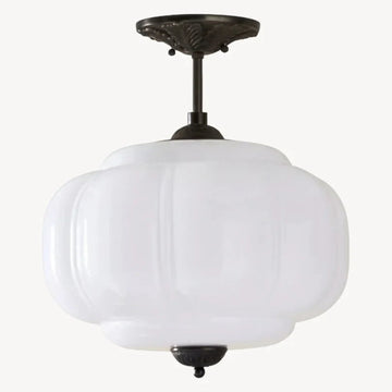 Elegant Green Glass Pendant Lighting with Antique Brass Accents for Stylish Kitchen Illumination