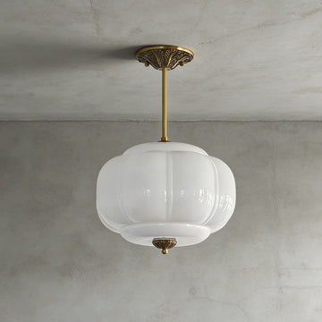 Elegant Green Glass Pendant Lighting with Antique Brass Accents for Stylish Kitchen Illumination