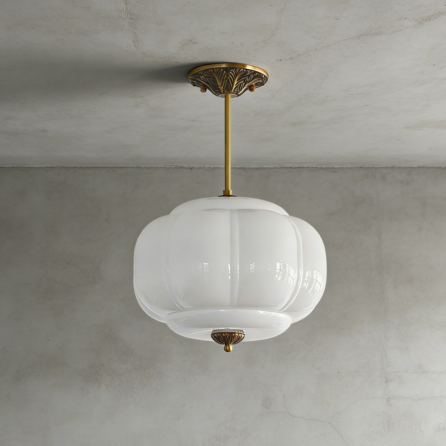Elegant Green Glass Pendant Lighting with Antique Brass Accents for Stylish Kitchen Illumination