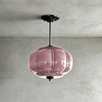 Elegant Green Glass Pendant Lighting with Antique Brass Accents for Stylish Kitchen Illumination