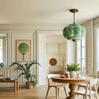 Elegant Green Glass Pendant Lighting with Antique Brass Accents for Stylish Kitchen Illumination