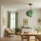 Elegant Green Glass Pendant Lighting with Antique Brass Accents for Stylish Kitchen Illumination