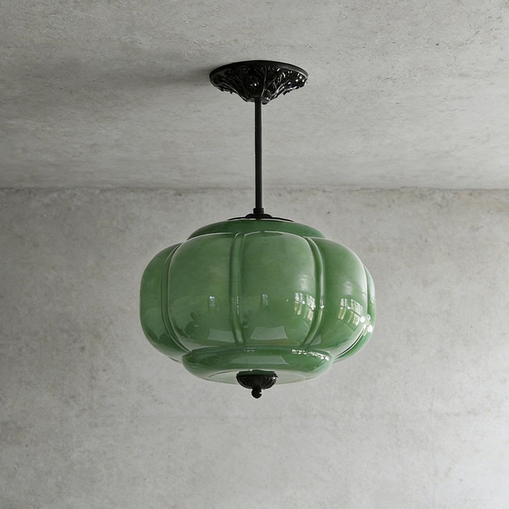 Elegant Green Glass Pendant Lighting with Antique Brass Accents for Stylish Kitchen Illumination