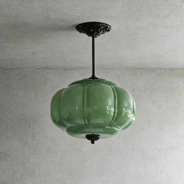 Elegant Green Glass Pendant Lighting with Antique Brass Accents for Stylish Kitchen Illumination