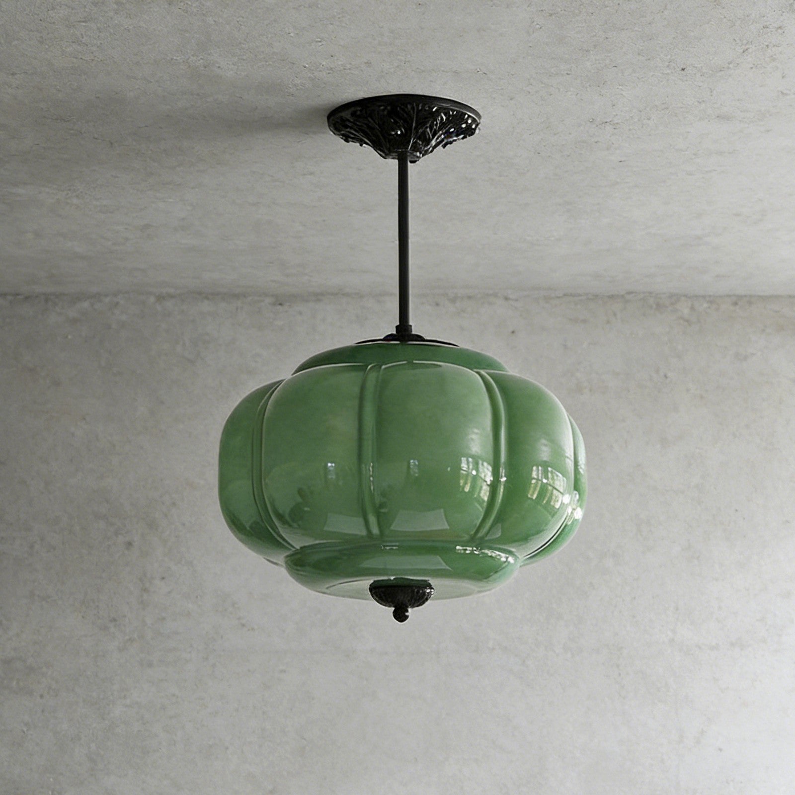 Elegant Green Glass Pendant Lighting with Antique Brass Accents for Stylish Kitchen Illumination