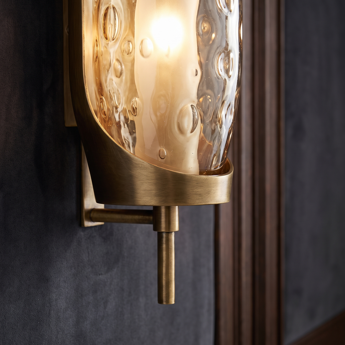 Premium lighting fixture detail in brass and glass