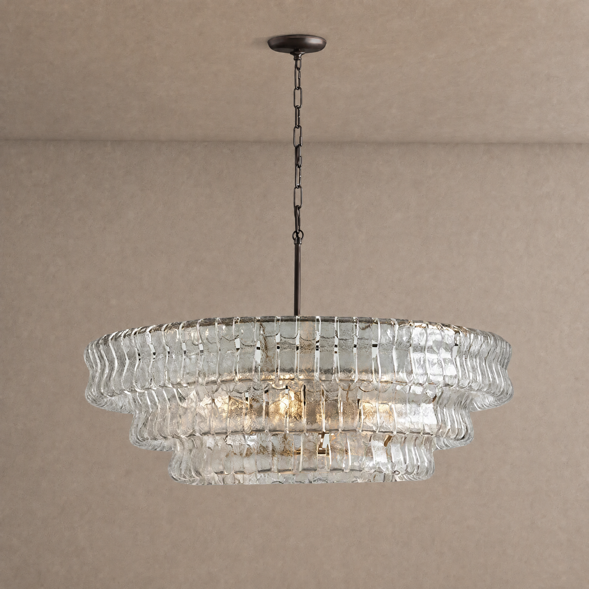 Ghiaccio round chandelier in clear ribbed hand-blown glass with dark bronze chain and canopy