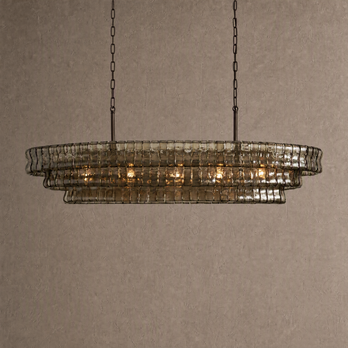 Ghiaccio oval chandelier in smoke gray ribbed glass with dark bronze chains
