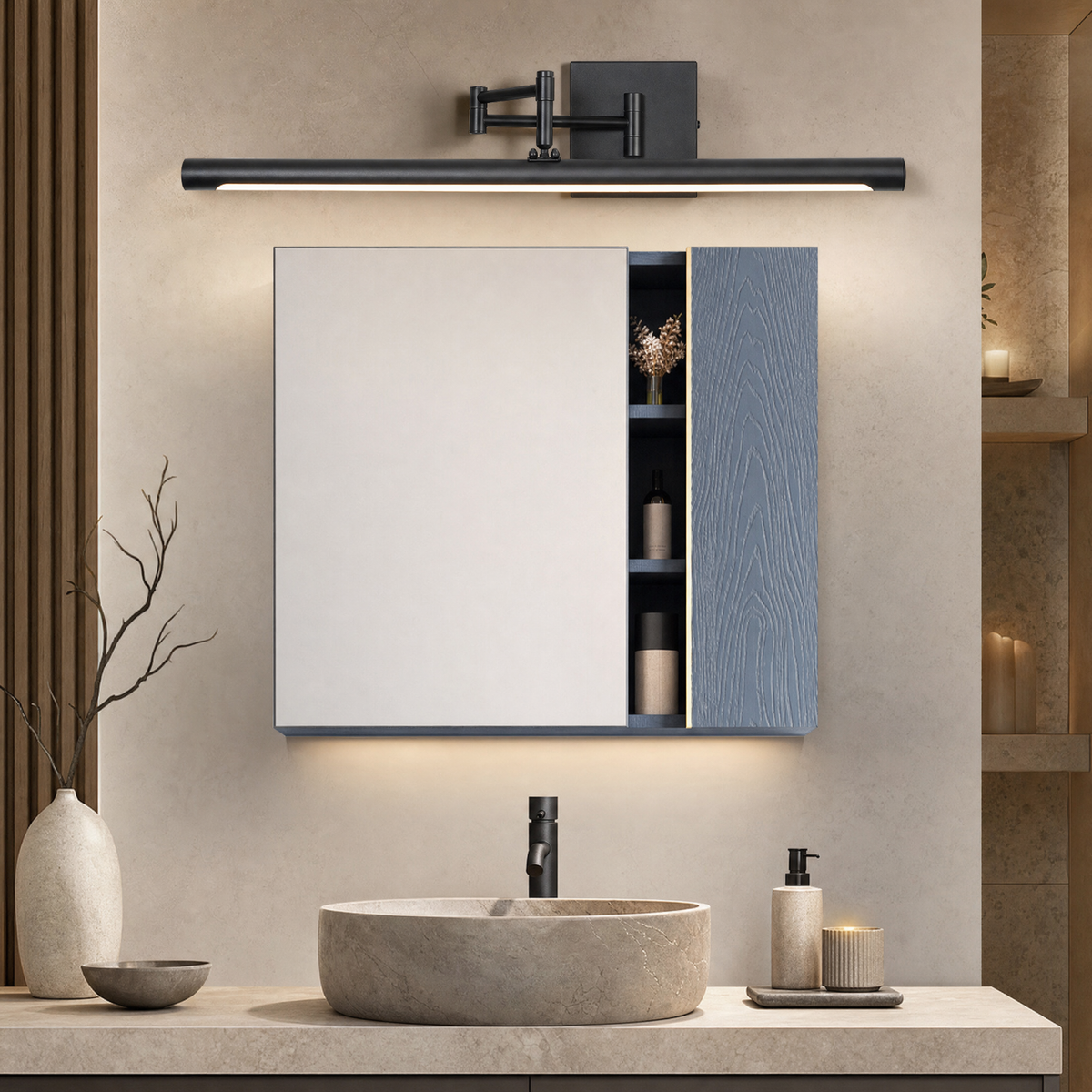 Black swing arm vanity light above a mirror cabinet with stone basin