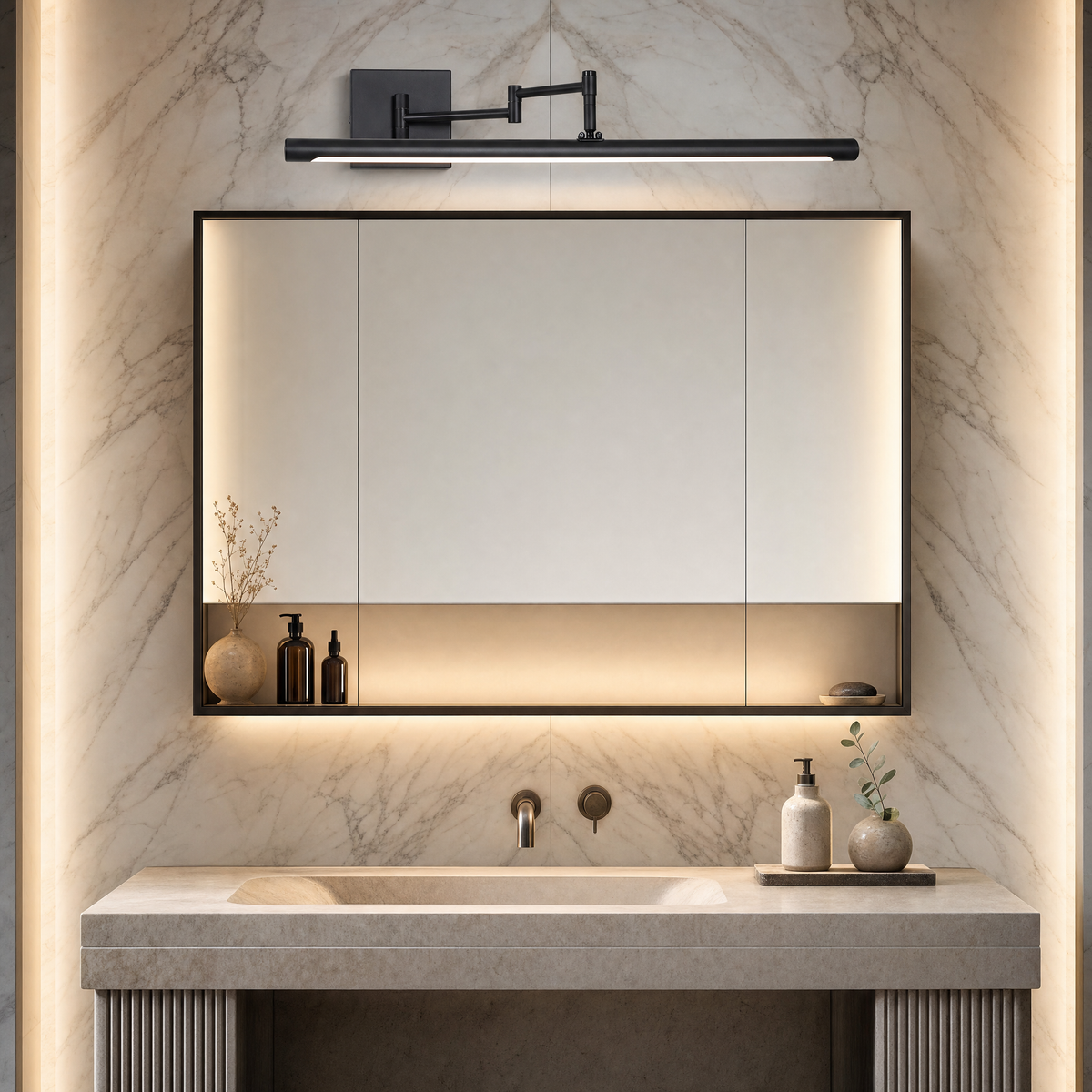 Black swing arm vanity light above a mirror cabinet in a marble spa bathroom